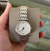 Watch Photo 0