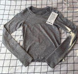 Lululemon Grey Long Sleeve Swiftly Tech Size 4, Race Length. Photo 0