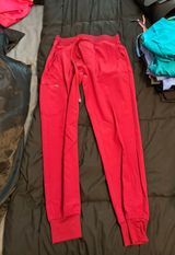 red scrub pants Photo 0