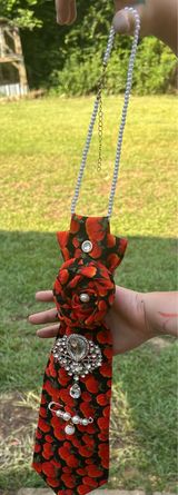 Brandy Melville This is a beautiful blak and orange pumpkin necktie necklace with rhinestones and pearl accessories great for Thanksgiving or Fall festivities Photo 0
