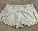 Free People Movement white shorts w/pink stitching Photo 0