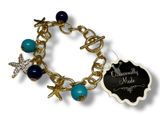 Occasionally Made Goldtone Starfish Charm Bracelet‎ Nautical Coastal Beads NWT Photo 0