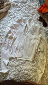 white workout jacket Photo 0
