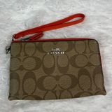 COACH Brown Signature Coated Canvas Wristlet Photo 0