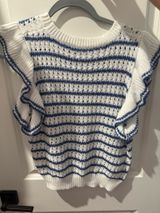 blue and white shirt Photo 0
