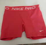 Nike Pro pink compression shorts in great pre-owned condition. Soft, stretchy, and perfect for workouts, running, the gym, or everyday athleisure wear. No major flaws. Photo 0