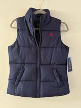 U.S. Polo Assn. Women’s Navy Puffer Vest with Red Logo Photo 0