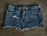 Free People distressed denim mini skirt with a frayed raw hem Photo 0