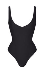 SKIMS Plunge Thong Unlined Bodysuit Photo 0