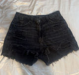 Black denim shorts with frayed hem Photo 0