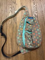 Kavu Sling Bag with Turquoise and Coral Accents Photo 0