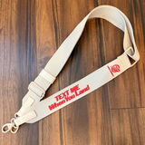 BEIS Lonely Ghost “Text Me When You Land” beige Travel Bag Strap with Red Text Photo 0
