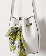 Minimal white bucket bag with removable floral scarf detail Photo 0