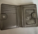 Compact Pebbled Leather Bifold Wallet in Silver Photo 0