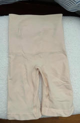 SKIMS Shapewear Mid-Thigh Shorts Photo 0