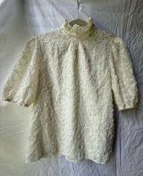 Shop the mint floral blouse  Photo 0