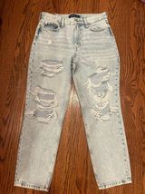 Ripped “Mom” Jeans Photo 0