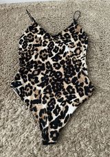 Cheetah print body suit gaze Photo 0