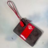 Coach wristlet with patent leather trim Photo 0