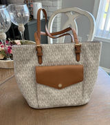 Michael Kors Cream Signature Tote with Brown Trim and Front Pocket Photo 0