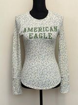 American Eagle Outfitters White Floral Long-Sleeve Tee with Green Logo Photo 0