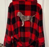 red and black buffalo plaid plush hooded robe from Victoria's Secret PINK featuring a large silver sequin dog logo on the back Photo 0
