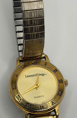 Linens n Things Quartz Gold Tone Stretch‎ Band Watch Roman Numerals Photo 0