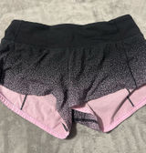 Pink and black Lululemon shorts Photo 0