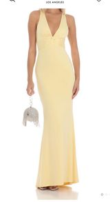 Front Twist Yellow Maxi Formal Dress Photo 0