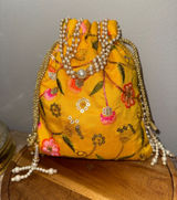 Yellow Floral Embroidered Indian potli Bag Photo 0