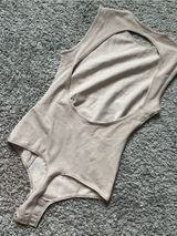 SKIMS Open-Back Ribbed Bodysuit in Beige Taupe Photo 0