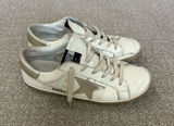 Dirty old sneakers White and Gold Star Low-Top Women's Sneakers Photo 0