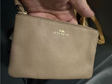 Coach Pebbled Leather Wristlet in Taupe with Gold Logo Photo 0