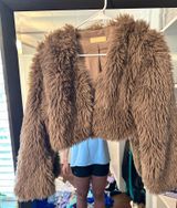C’isa fur coat  Photo 0