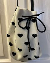 Cross body white with black hearts purse Photo 0