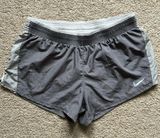 Nike women’s‎ dri-fit shorts size: L color: Gray/White Photo 0