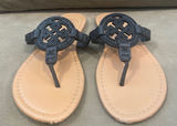 Daisy Fuentes Black and Tan Sandals with Classic Slip-On Design Photo 0