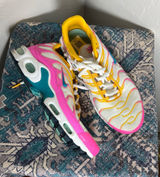 Nike Women's White Mesh Athletic Sneakers with Yellow & Pink Accents Photo 0