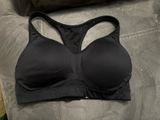 Experience comfort and support with this sleek black racerback sports bra. Perfect for workouts or everyday wear. Size 36C GREAT support great condition too small for me sadly Old navy Photo 0