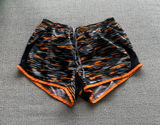 Nike‎ Womens Dri-FIT Running Shorts Orange Black Camo Tiger Stripe Medium Photo 0