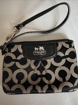 Coach Black and Tan Signature Pattern Wristlet Photo 0