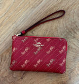 COACH Corner Zip Wristlet With Horse and Carriage Dot Print Photo 0