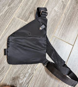 Black Slim Travel Anti-theft Crossbody Sling money and valuables Bag NWOT Photo 0