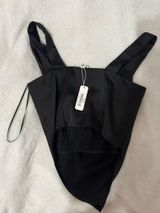 NWT Boutique Black Bandana Top, would be perfect for going out or gameday!! It’s to big on me so i’ve never worn! Really nice silky material! Bought for $49 asking $15 😊 #gamedaytop #goingouttop #bandanatop silky fabric, black top, bandana style, sleeveless, crop top, party wear, nightlife fashion, statement top, trendy, chic Photo 0
