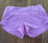 Purple/pink Lululemon speed up shorts 2.5’ size 2. Photo 0