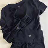 Aritzia Tna Butter Set this set comes with cheeky biker shorts, hold tight bra, and butter bound t-shirt all in black set retails for $136 Photo 0