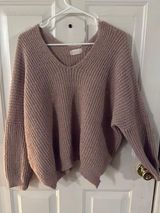 This is an  altered state sweater  Photo 0