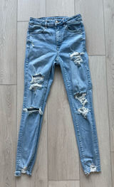 American Eagle Ripped Blue Jeans Stretch Skinny high rise women’s US 4 Photo 0
