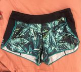 Athleta Black and Green Athletic Shorts Moisture-Wicking Relaxed Fit Photo 0