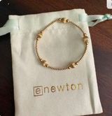 Wheaton Gold Textured Bead Stretch Photo 0